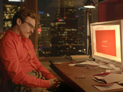 Joaquin Phoenix as a man in love with a machine in 2013 top romance film Her.