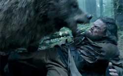 Leonardo DiCaprio has a bad day with a bear in the top action drama of 2015, The Revenant.