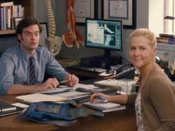 Amy Schumer and Bill Hader make a connection in the top 2015 comedy Trainwreck.