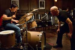 Miles Teller tries to keep up with J.K. Simmons' harsh lessons in the Academy Award-Winner Drama, Whiplash.